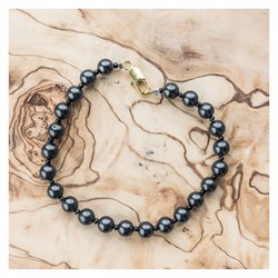 BRACCIALE DI SHUNGITE - PERLE TONDE E CILINDRI IN MARMO NERO Cristalli e altro